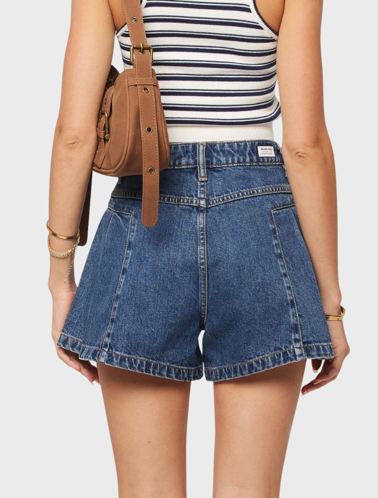 Elegant mid blue pleated shorts by Bella, ideal for a chic summer look or casual day out.