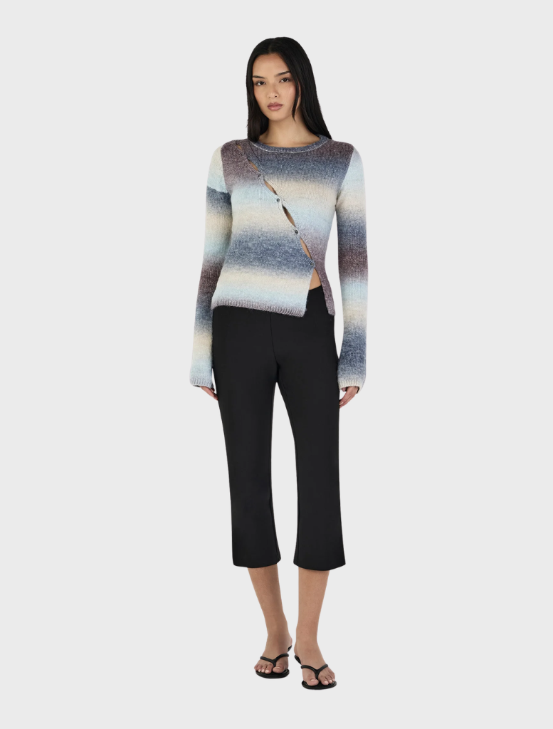 Elegant asymmetrical cardigan in a rich cocoa gradient, designed for comfort and a chic layered appearance.