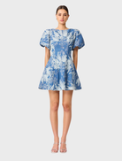 A blue and ivory A-line mini dress with a fitted bodice and flared skirt, perfect for casual or semi-formal occasions.