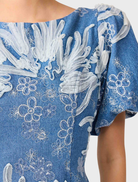 Anneliese A-line mini dress in blue and ivory, showcasing a chic silhouette perfect for summer outings.