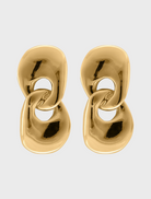 Two gold tone earrings featuring a circular design, elegantly crafted for a stylish accessory choice.