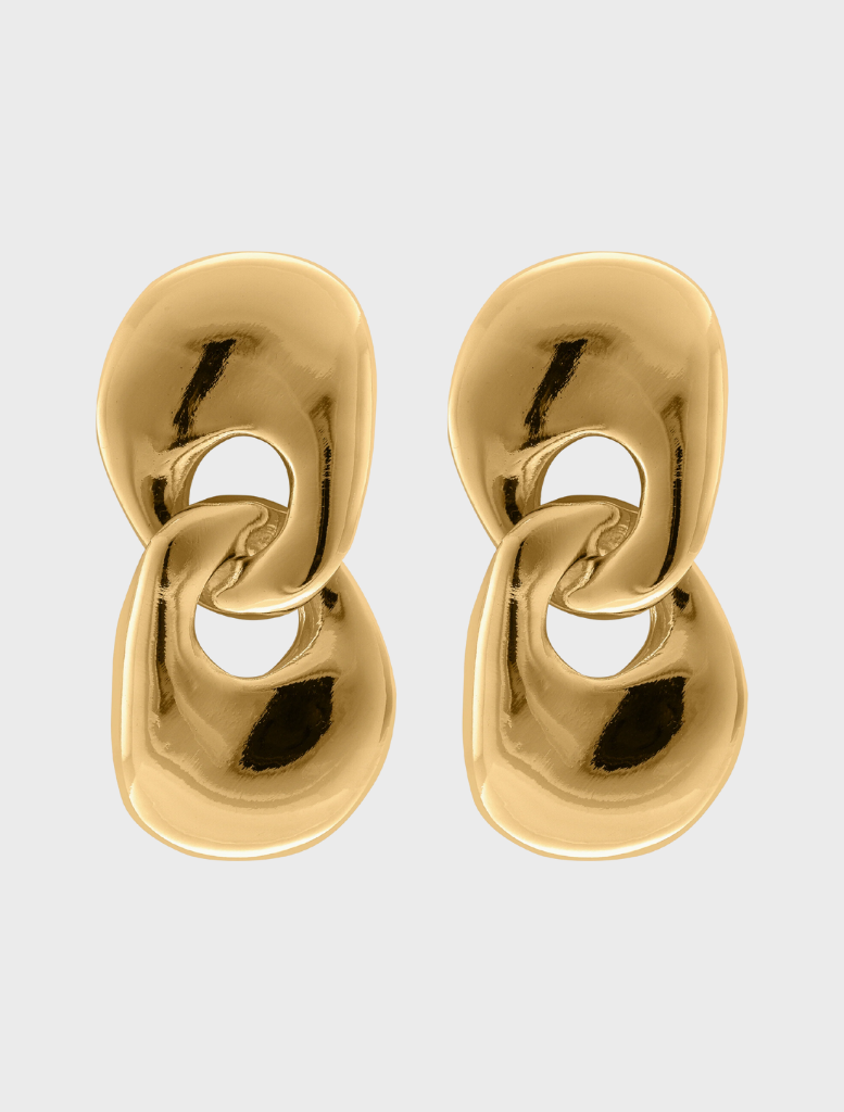 Two gold tone earrings featuring a circular design, elegantly crafted for a stylish accessory choice.