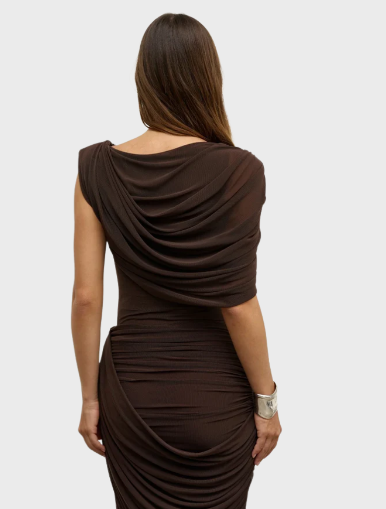 The Sorella bodysuit in ash, elegantly draped on a hanger, emphasizing its contemporary style and color.