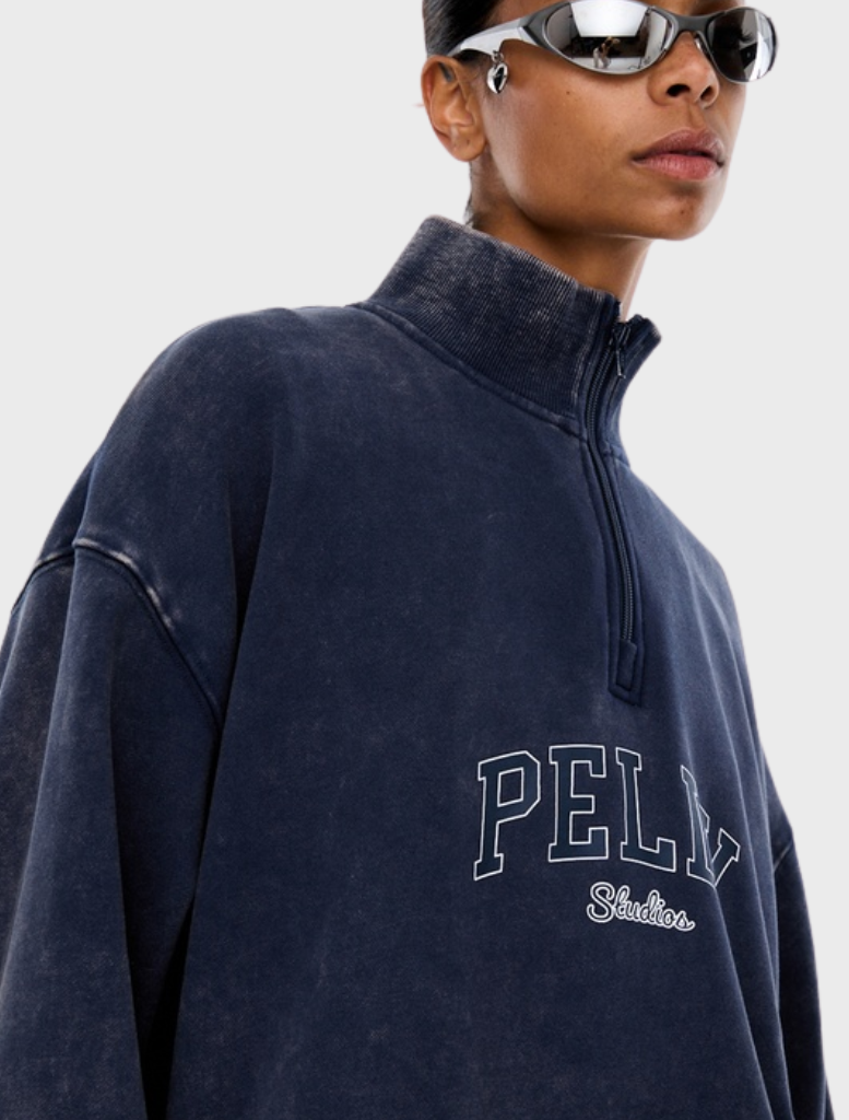Asher Quarter Zip, Washed Ink color, designed by ENA PELLY, emphasizing bold lines and clean silhouettes in fashion.