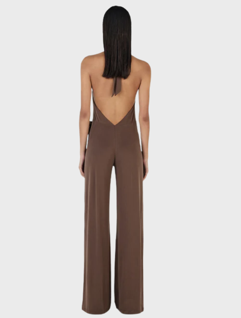 Chocolate-colored Astrid jumpsuit displayed on a mannequin, featuring a fitted bodice and wide-leg pants.