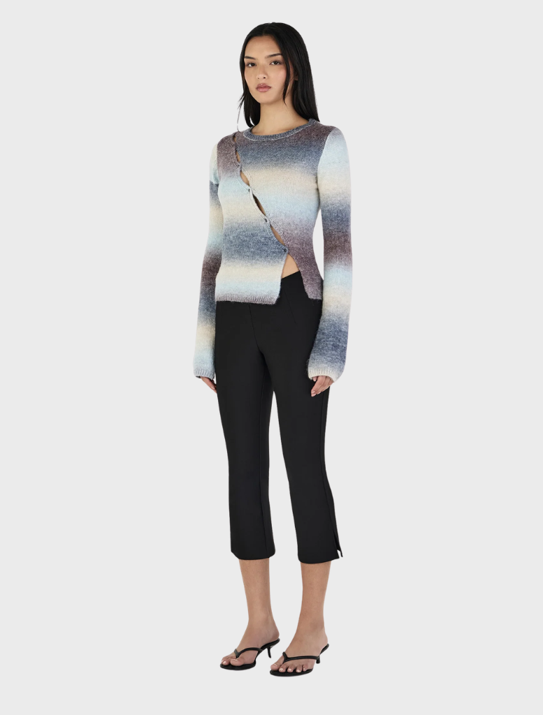 Asymmetrical cardigan in a warm cocoa gradient, offering a contemporary design and soft fabric for everyday wear.