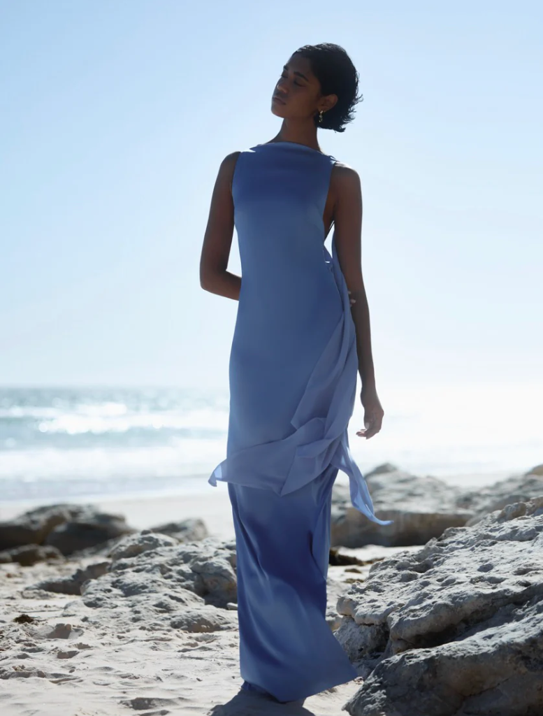 Beautiful ocean blue Audrey dress showcasing a fitted top and a flared skirt, suitable for various events.