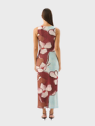 Featuring a bright floral Marisol Bloom design, the Avalon Dress combines elegance and comfort for any warm-weather event.