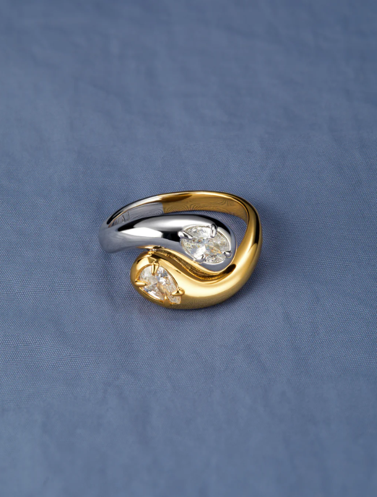 The Georgia Stone Omega Necklace: a gold choke style adorned with a sparkling diamond charm.