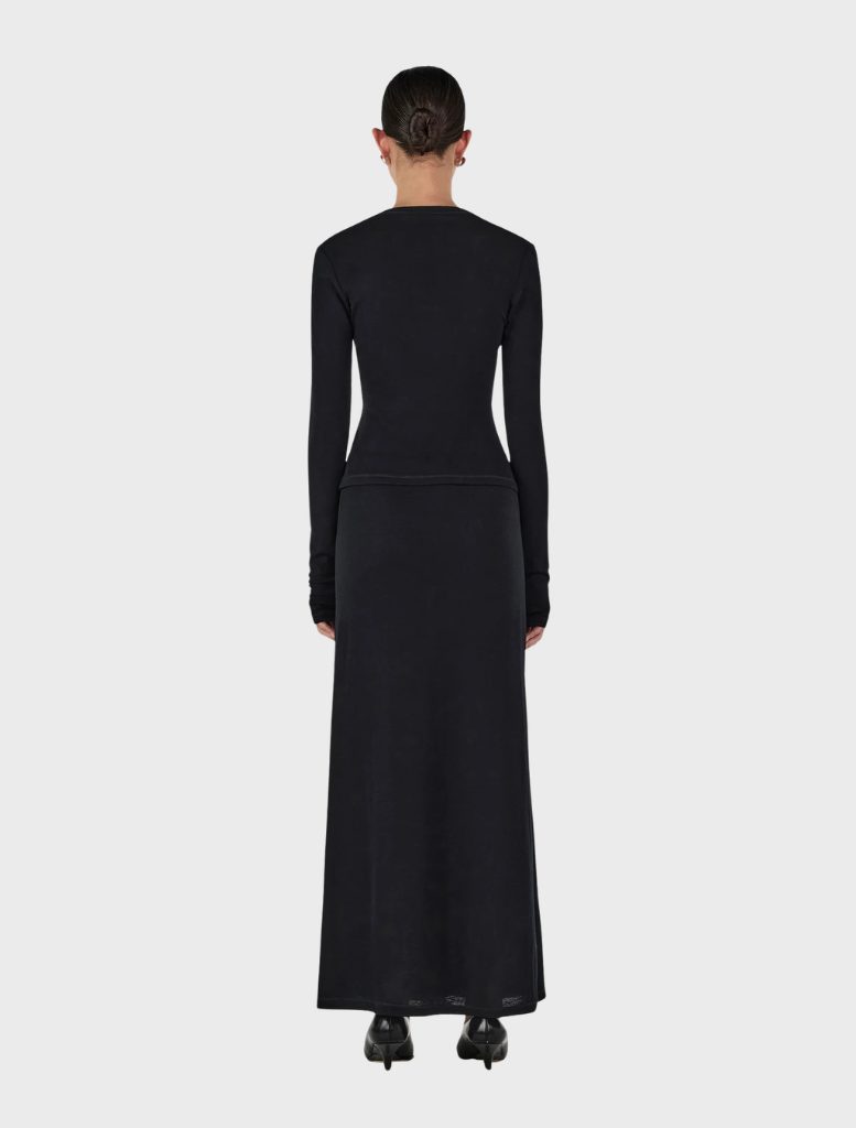 Gerard's black wool skirt, showcasing a timeless silhouette ideal for various outfits.