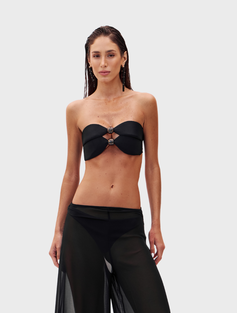 Elegant black Karima set consisting of a fitted top and coordinating pants, perfect for various occasions.