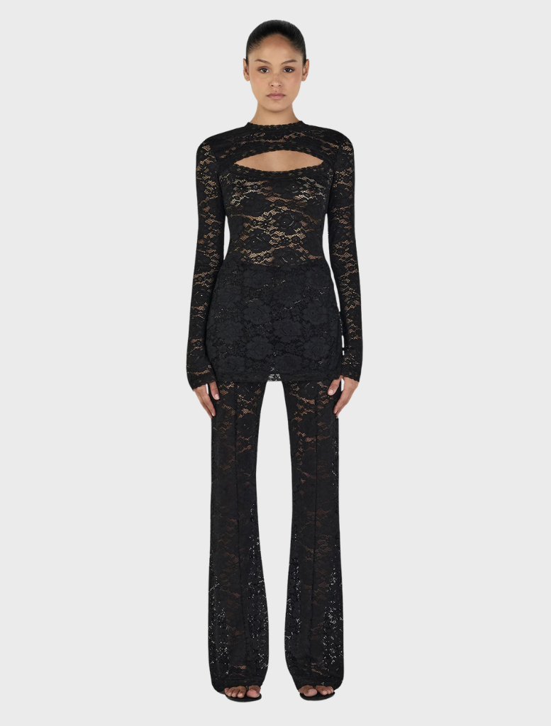 Elegant black long sleeve top from Misha, perfect for layering or standalone wear.