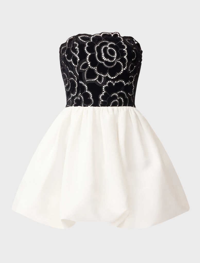 Modern black and white strapless mini dress with a tailored fit, ideal for a sophisticated and fashionable outfit.