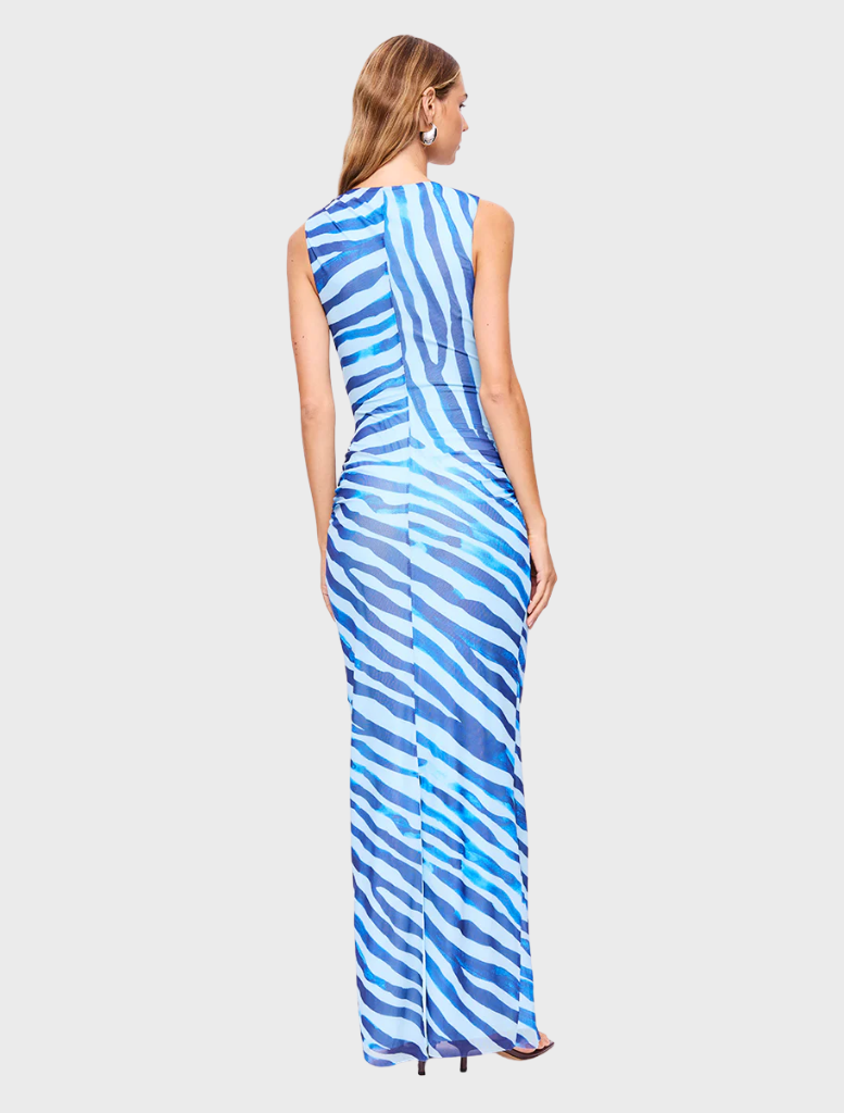 Aleks sleeveless maxi dress in blue with a striking zebra pattern, designed for comfort and elegance during summer events.
