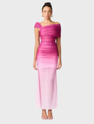 Elegant Brigitta maxi dress in a vibrant orchid ombre design, featuring a flowing silhouette and soft fabric.