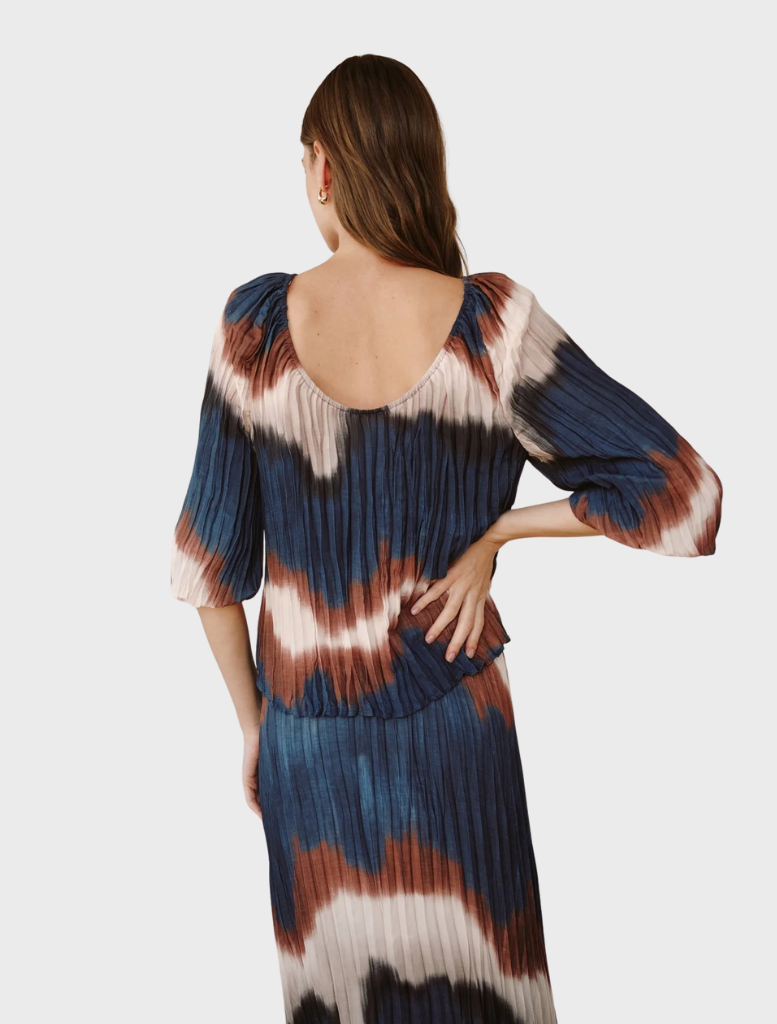 Fashionable pleated blouse with 3/4 bubble sleeves, designed in a captivating Midnight Tides print of swirling colors.