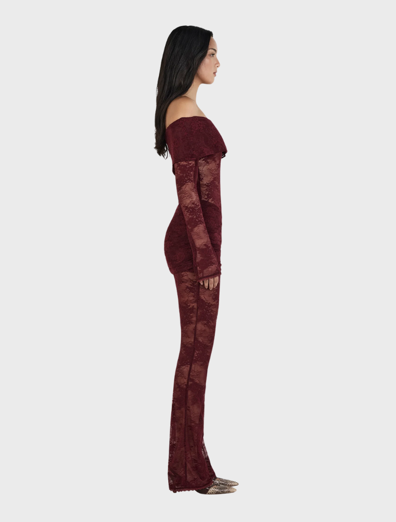 Burgundy lace jumpsuit featuring intricate lace detailing, designed for elegance and style.