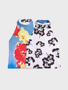 Two tops with bright floral prints, presented side by side on a flat surface.