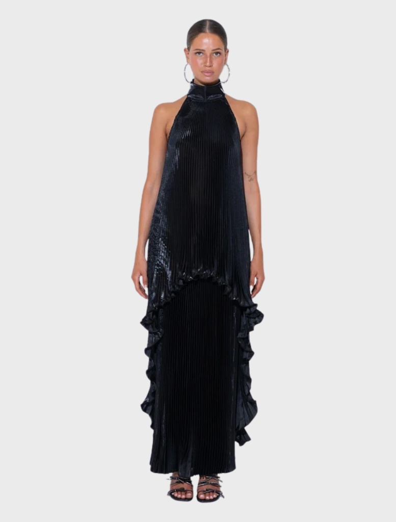 The Caribbean Mini in gloss noir features a halter neckline, pleated fabric, and an elegant asymmetrical silhouette.