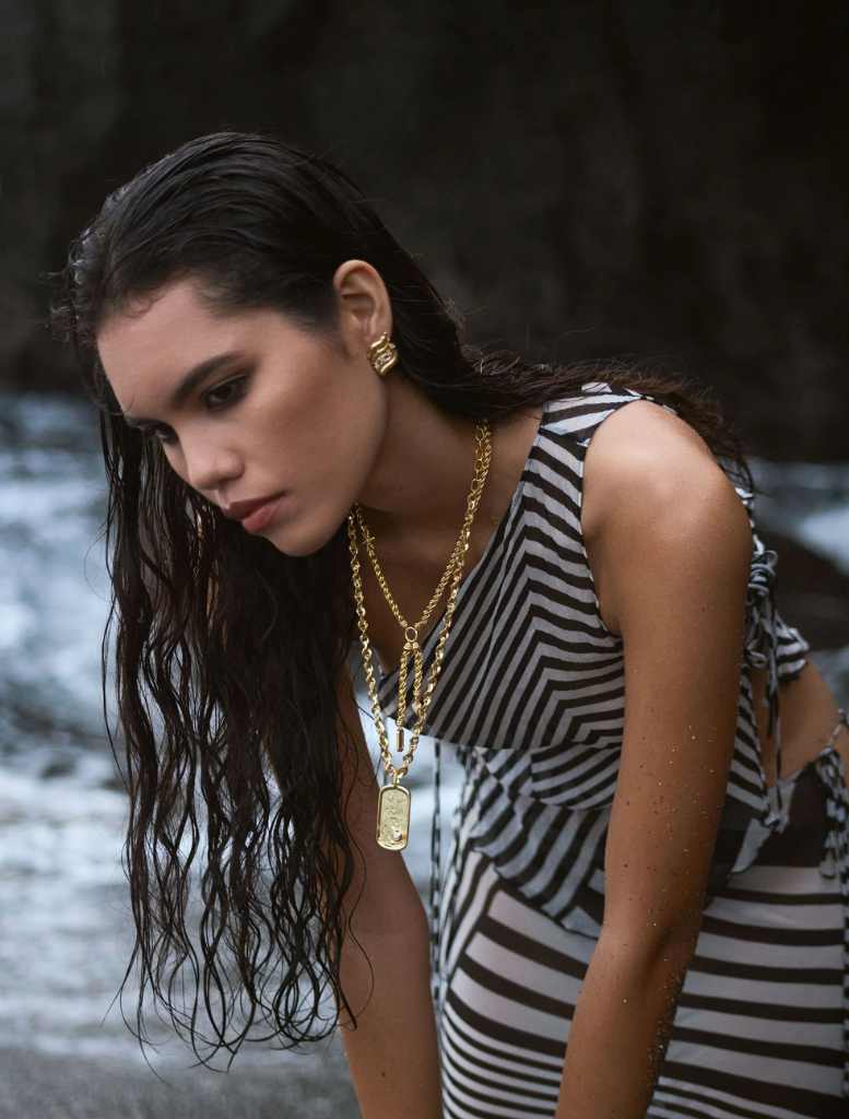 Gold Cassia necklace with a chic design, featuring detailed craftsmanship and a radiant shine.
