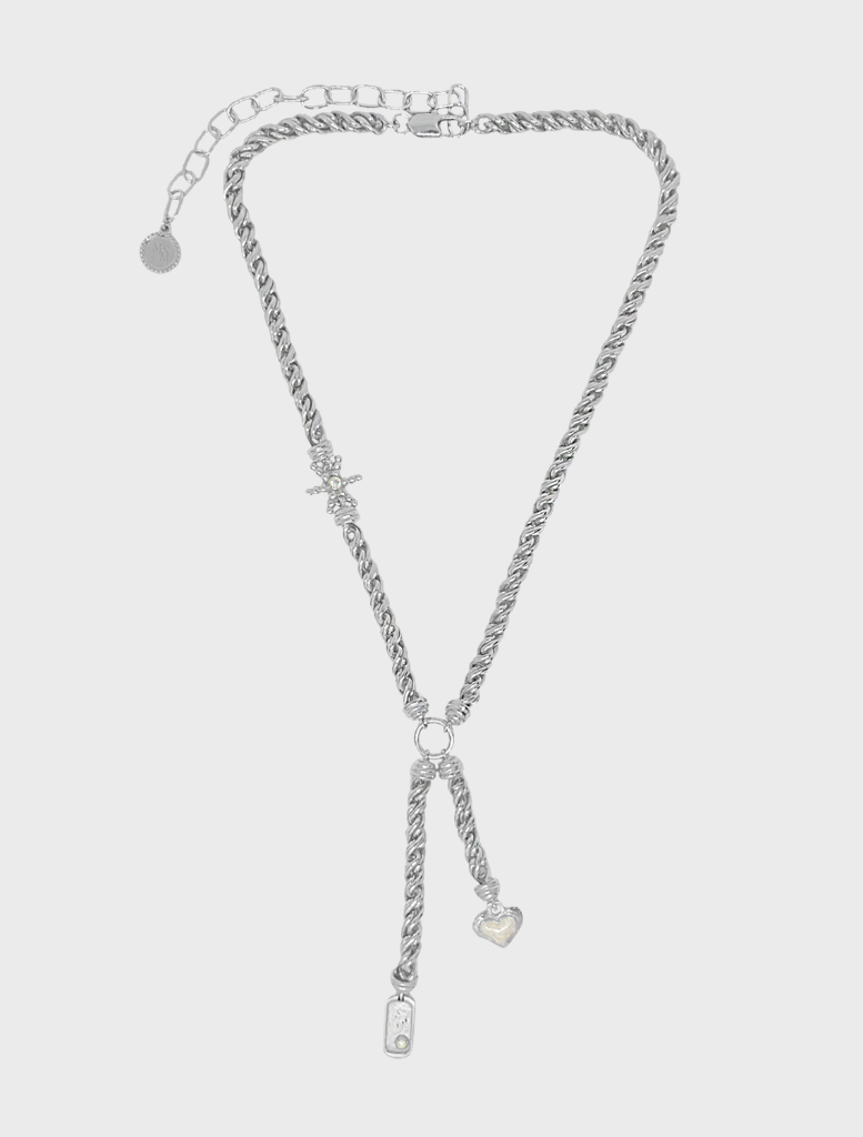 Silver Cassia necklace featuring an elegant design with intricate detailing and a polished finish.