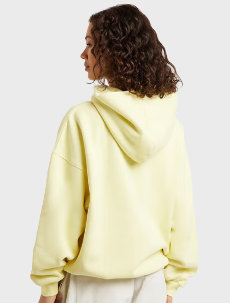 Comfortable oversized hoodie in celestial yellow, crafted from cotton-rich materials with a stylish graphic design.