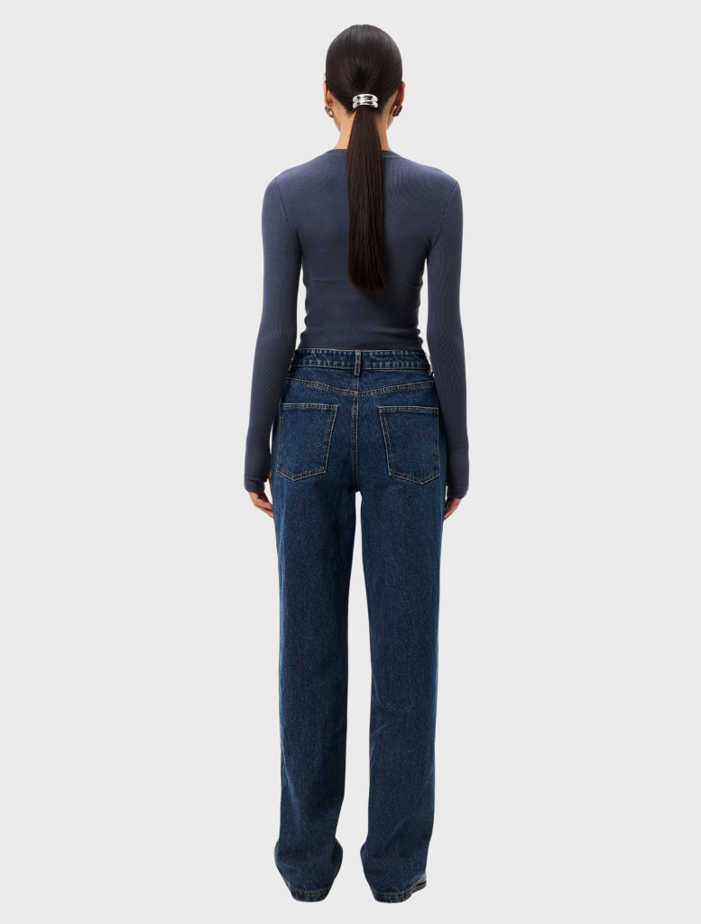Stylish sapphire top with a smooth texture, round neck, and short sleeves, suitable for both casual and formal wear.