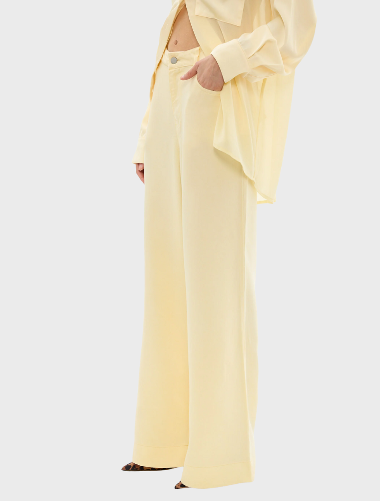 Pale yellow leopard print shorts, designed with soft, stretchy fabric, from the Celeste Jean Pant collection.