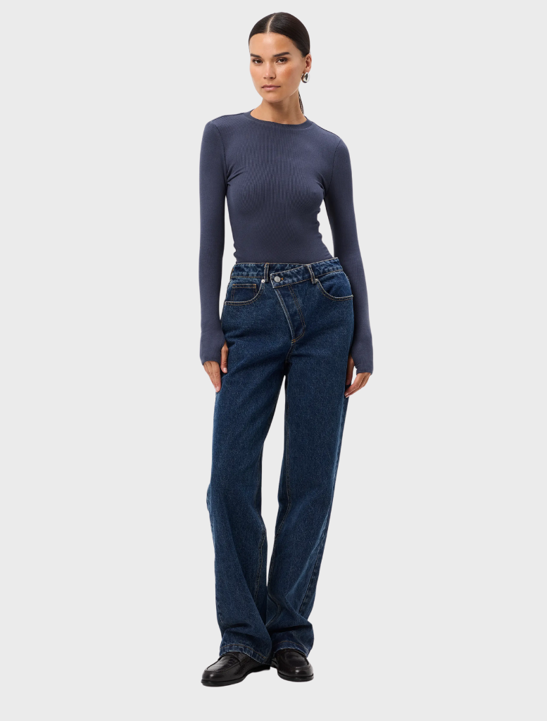 Elegant sapphire blue top showcasing a fitted silhouette, round neckline, and short sleeves, ideal for versatile styling.