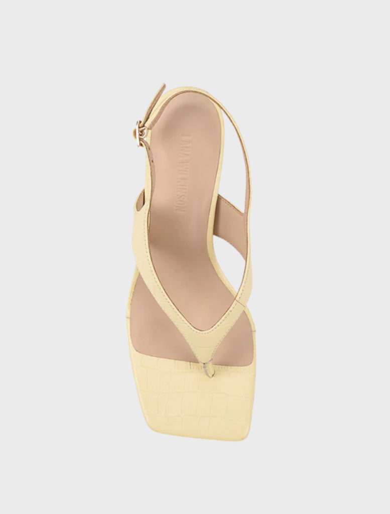 Light blue denim shirt dress with a collar, made from lyocell, offering a relaxed and fashionable look.