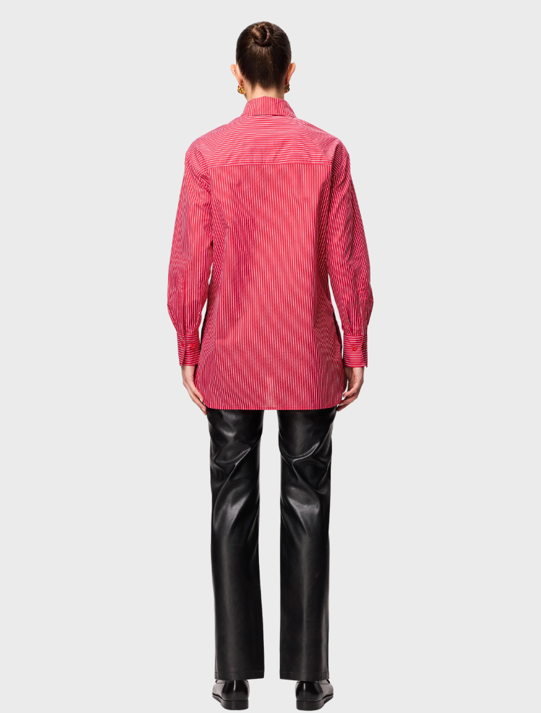Classic white Lincoln top showcasing a timeless silhouette, versatile for various outfits and occasions.