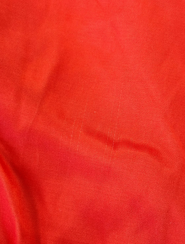 Stylish orange maxi dress with long sleeves, offering a chic and comfortable look for any outing.