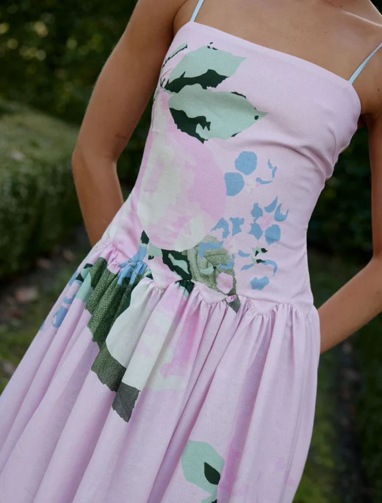 Cordelia Dress by Baby Le Fruit, adorned with a vibrant fruit pattern, ideal for young children.