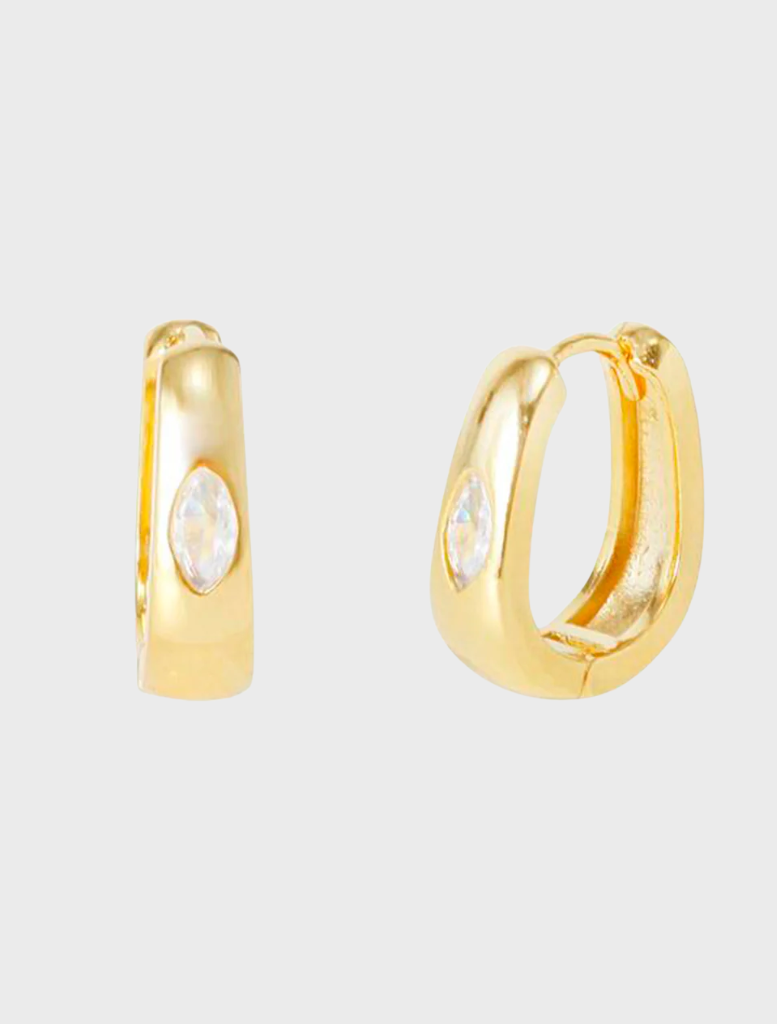 A pair of elegant gold Cynthia Sleepers, showcasing a sleek design and polished finish.