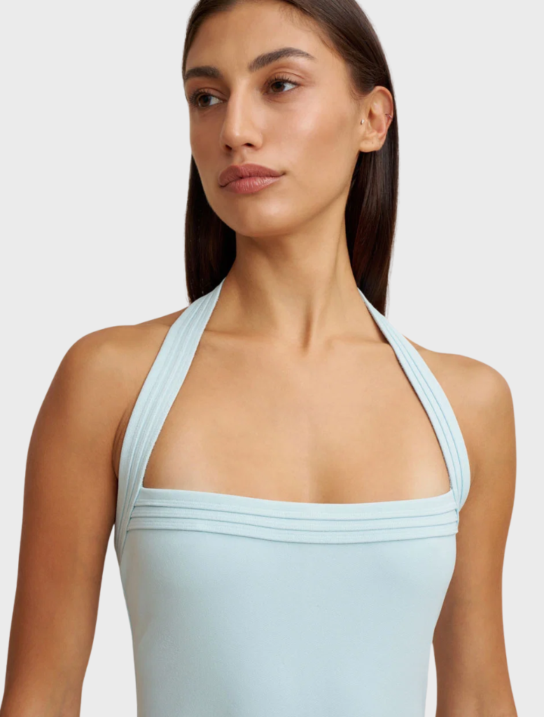 Halter neck top in ice blue, made from stretch crepe for a snug fit, with distinctive triple bind detailing on the straps.