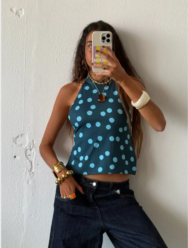 Dalia Reversible Top featuring a stylish design, suitable for versatile wear in various settings and occasions.