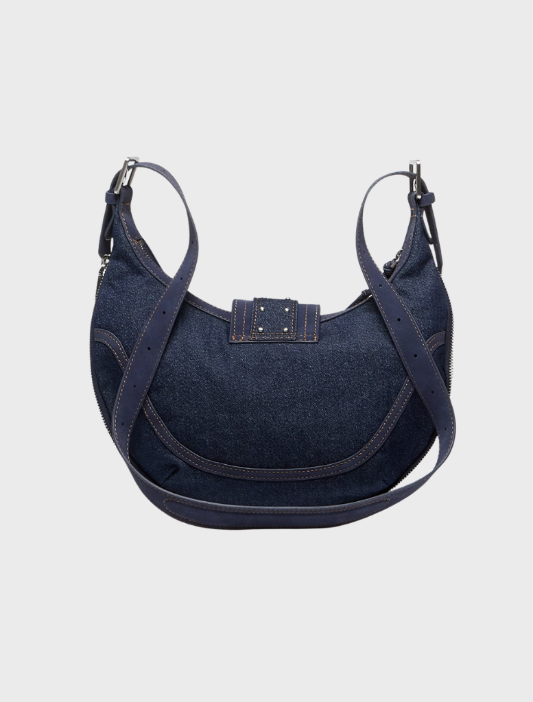 Stylish shoulder bag made of dark blue denim, suitable for casual wear and practical for daily use.