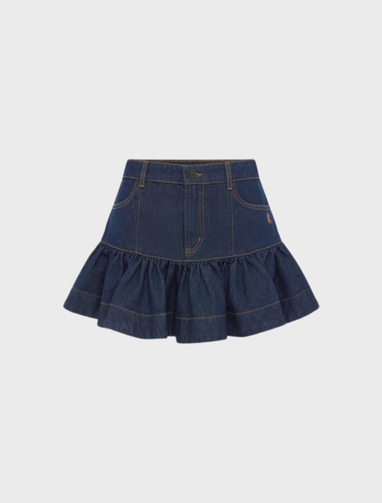Ruffle mini skirt in deep indigo, combining elegance and playfulness for a fashionable ensemble.
