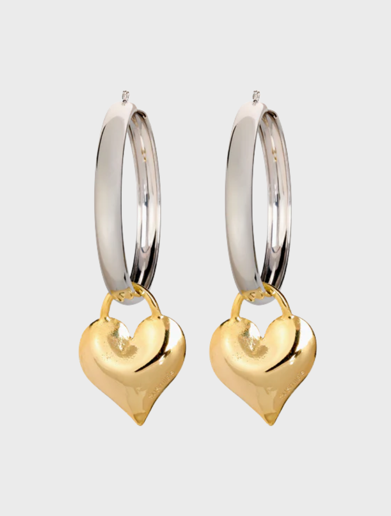 Two-tone heart hoop earrings featuring a stylish blend of colors and a modern design.