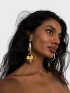 Two-tone heart hoop earrings featuring a stylish blend of colors and a modern design.