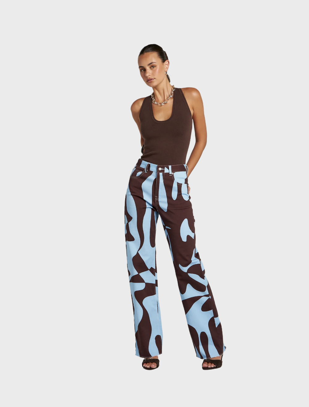 Easy Jean designed for comfort, featuring a high waist, straight leg, and exclusive Mirage artwork for a stylish finish.