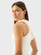 Ivory Paloma Tank top laid flat, emphasizing its smooth texture and classic silhouette for everyday fashion.