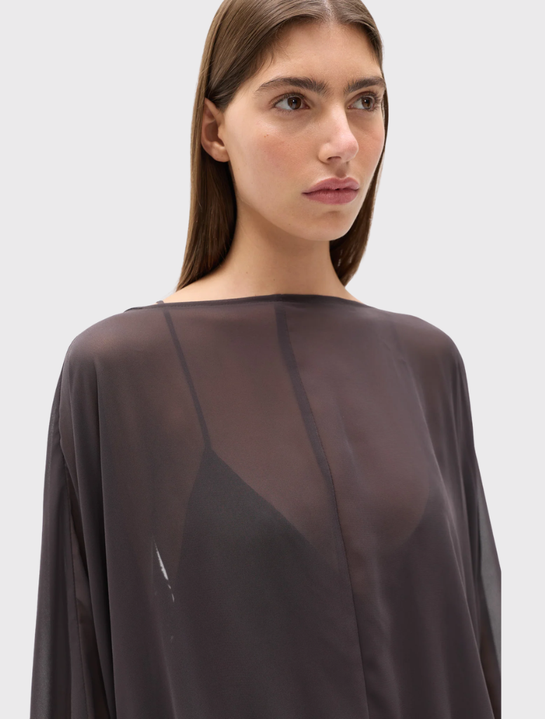 Evariel Mini Dress, Truffle color, features a boat neckline, sheer fabric, voluminous sleeves, and a low open back with criss-cross straps.