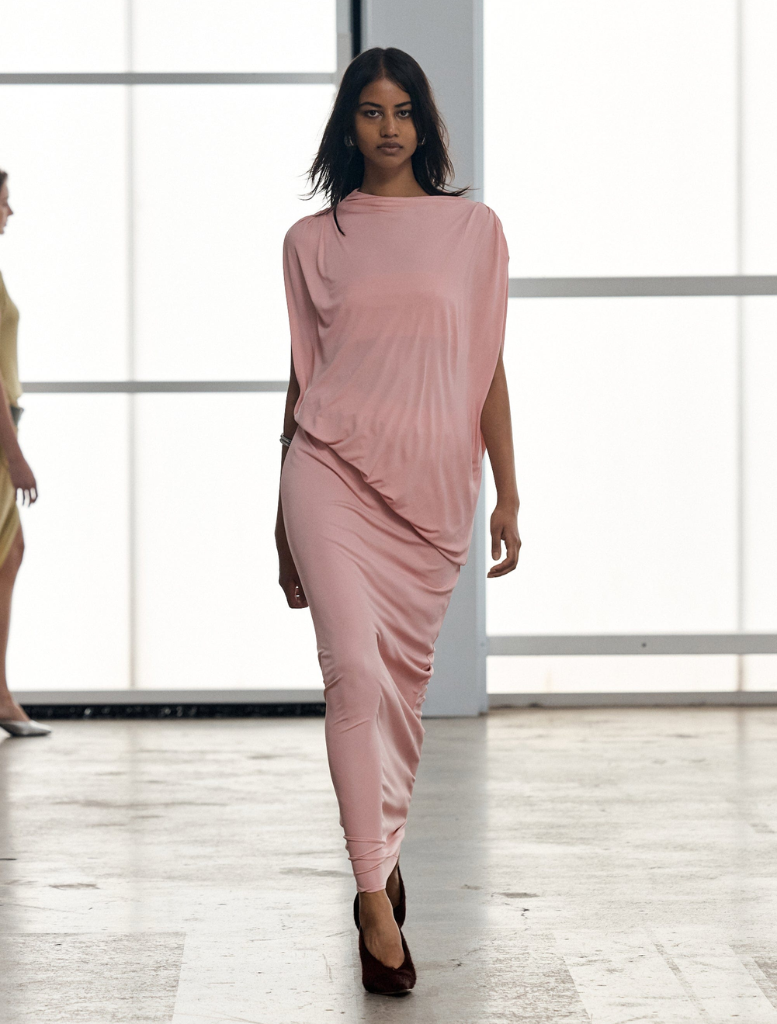 Stylish fall-themed floor-length dress featuring a vibrant floral design, ideal for formal occasions and celebrations.