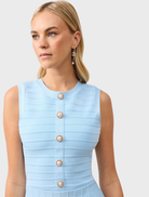 Contemporary bridal blue Fiona mini dress, emphasizing a fitted design and elegant details for a stylish wedding outfit.