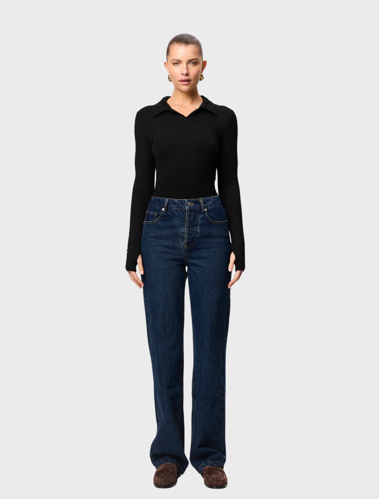 Black Florence polo top featuring a classic design and a comfortable fit, suitable for casual or semi-formal occasions.