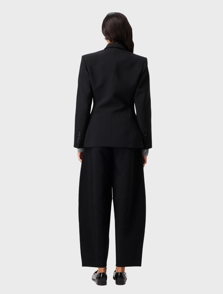 Elegant black Sonder Blazer on a hanger, showcasing a modern cut ideal for professional and formal settings.