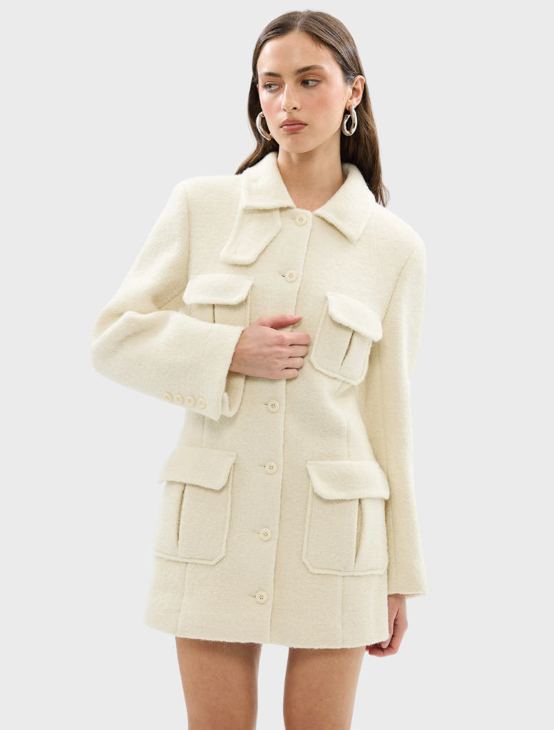 Elegant ivory Franca Wool Blazer Dress with a fitted design, ideal for professional and formal settings.