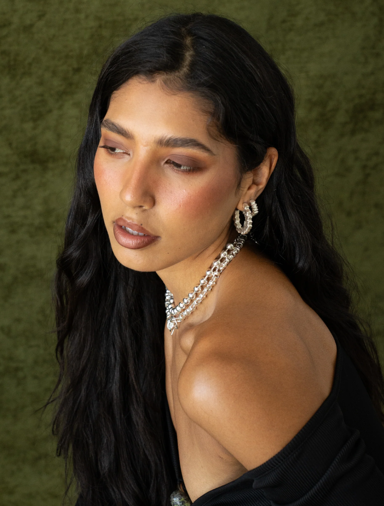 Stylish silver Gabrielle earrings, ideal for accessorizing various outfits with a touch of elegance.