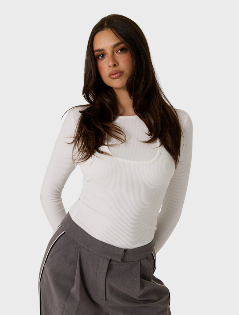 White double layer top featuring a stylish design, suitable for various occasions and easy to pair with different outfits.